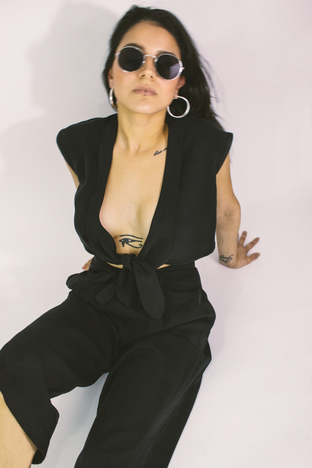 Woman wearing the Classics Atelier black Draka top by Carmen Calburean
