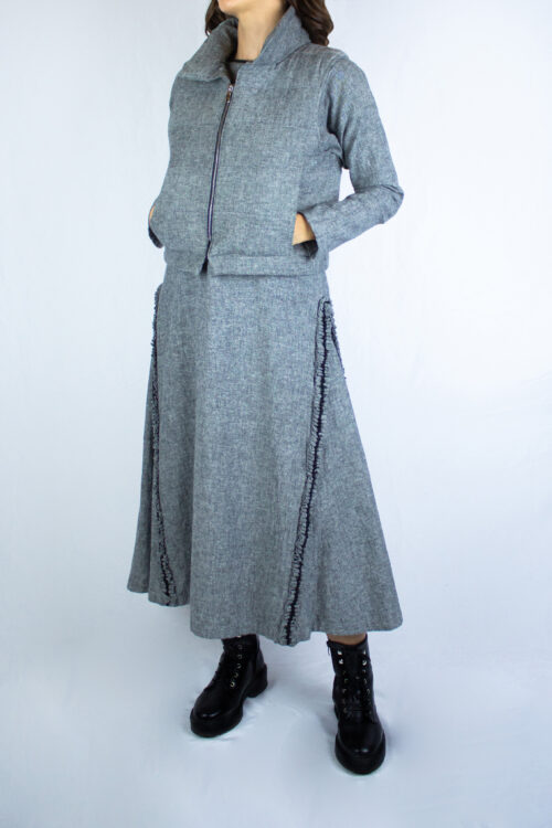 Woman wearing grey Lita organic vest by Carmen Calburean